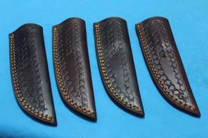 lot 203 image: 4. GENIUNE LEATHER SHEATHS