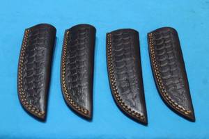 lot 209 image: 4. GENIUNE LEATHER SHEATHS
