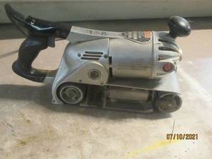 lot 65 image: SKIL BELT SANDER MODEL 448