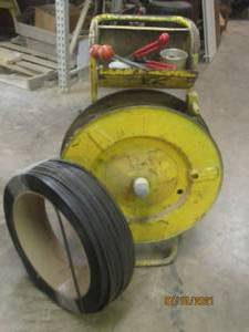 lot 75 image: STRAPPING DISPENSER MACHINE WITH ROLL OF STRAPPING