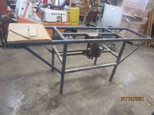 lot 113 image: SHOP TABLE WITH ATTATCHED DAYTON MOTOR 5K960B