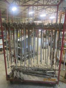 lot 120 image: GENEROUS AMOUNT OF TWO WAY CLAMP POLE EXTENDERS ( CART NOT INCLUDED )