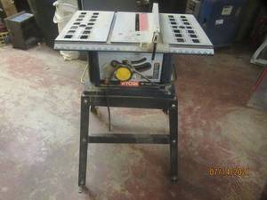 lot 276 image: RYOBI 10 TABLE SAW BTS10S