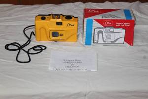 lot 20 image: VINTAGE LEXXUS YELLOW POINT AND SHOOT 35MM FILM CAMERA IN ORIGINAL BOX