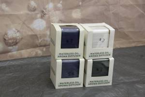 lot 58 image: 4 WATERLESS OIL AROMA DIFFUSERS