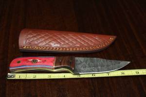 lot 84 image: DAMACAS STEEL HUNTING KNIFE WITH CUSTOM HAND CARVED HANDLE