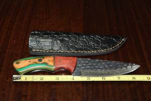 lot 87 image: CARBON STEEL HUNTING KNIFE WITH CUSTOM HAND CARVED HANDLE