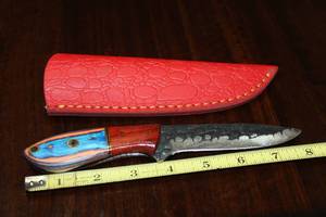 lot 91 image: CARBON STEEL HUNTING KNIFE WITH CUSTOM HAND CARVED HANDLE