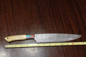 lot 110 image: DAMASCAS STEEL CHEFS BUTCHERS KNIFE WITH CUSTOM HAND CARVED HANDLE
