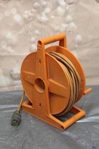 lot 37 image: 100FT EXTENSION CORD AND WHEEL