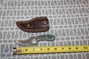 lot 104 image: DAMACAS STEEL BOOT KNIFE WITH CUSTOM HAND CARVED HANDLE