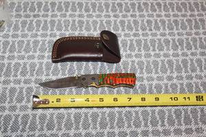 lot 108 image: DAMACAS STEEL FOLDING  KNIFE WITH CUSTOM HAND CARVED HANDLE