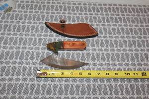 lot 112 image: DAMACAS STEEL ULU KNIFE WITH HAND CARVED HANDLE