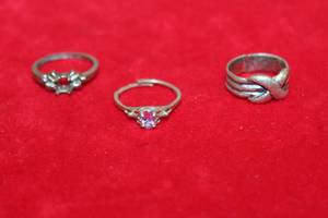 lot 159 image: TOTAL OF 3 STERLING SILVER RINGS STAMPED 925 , WT TOTAL 8.6 G  SEE PICS