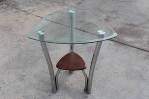 lot 177 image: TRIANGLE GLASS TOP SIDE TABLE WITH WOOD SHELF