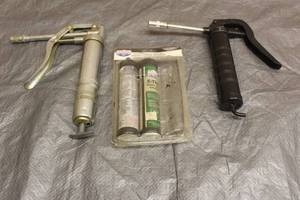 lot 49 image: TOTAL OF 2 PISTOL GRIP GREASE GUNS WITH MULTI PURPOSE GREASE TUBES&nbsp
