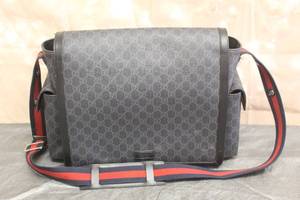 lot 33 image: GUCCI SUPREME DIAPER BAG MADE IN ITALY, 17 L X 13H