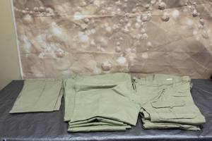 lot 81 image: TOTAL OF 7 ASSORTED SIZE KHAKI DICKIE WORK PANTS  CARGO PANTS  SEE PICS&nbsp