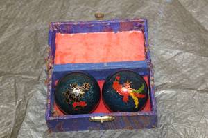 lot 118 image: MID CENTURY BAUDING CHINESE CHIME STRESS BALLS HEALTH BALLS IN STORAGE CASE&nbsp