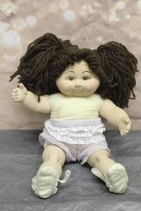 lot 124 image: VINTAGE PORCELAIN FACE,HANDS LEGS WITH YARN HAIR BIG DOLL&nbsp
