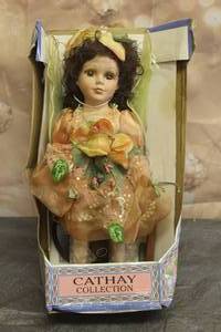 lot 135 image: VINTAGE CATHAY COLLECTION PORCELAIN DOLL GERI No.66 OF 5000 WITH CERTIFIED SIGNATURE WITH STAND  SEE PICS&nbsp