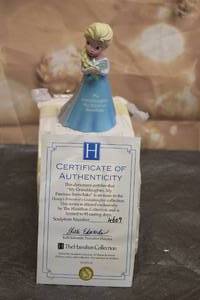 lot 148 image: THE HAMILTON COLLECTION DISNEY FROZEN  MY GRANDDAUGHTER , MY PRECIOUS SNOWFLAKE  SCULPTURE WITH COA No 4609