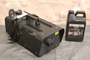 lot 211 image: SHENZHEN QIAOHUA INDUSTRIES FOG MACHINE FM1000-A WITH CELEBRATE FOG SOLUTION&nbsp