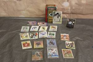lot 215 image: LOT OF ASSORTED BRANDYEAR NFL FOOTBALL TRADING CRADS , INCLUDING 2005 TOPPS GREEN BAY PACKERS TIN WITH OVERSIZED VINCE LOMBARDI TRADING CARD &amp NFL RIDDELL POCKET HELMET  SEE PICS&nbsp