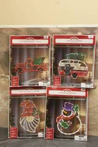 lot 244 image: TOTAL OF 4 HOLIDAY TIME LIGHTED&nbsp LARGE WINDOW DECORATIONS -&nbsp SANTA GNOME, HOLIDAY TRUCK , LIGHTED CAMPER, LIGHTED SNOWMAN&nbsp