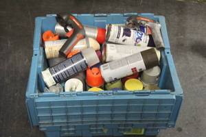 lot 189 image: TOTE OF ASSORTED COLORS SPRAY PAINT ALL AT LEAST HALF FULL WITH 2 CAN HOLDERGUNS TOTE INCLUDED