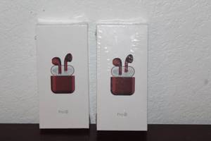 lot 145 image: 2 NEW PRO 4 RED WIRELESS EAR BUDS