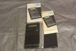 lot 69 image: SLIMLINE TI25 POCKET SCIENTIFIC ELECTRONIC CALCULATOR IN ORIGNAL BOX
