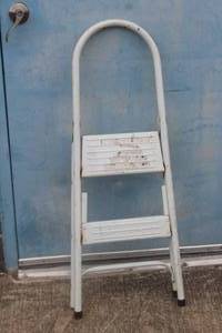 lot 100 image: 2 STEP FOLD AWAY LADDER