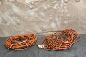 lot 103 image: TWO 25FT EXTENTION CORDS