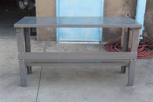 lot 14 image: UNLINE INDUSTRIAL PACKING TABLE 72x30 STEEL TOP ADJUSTABLE STEEL LEGS 500LB CAP