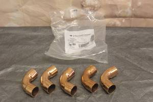 lot 145 image: ELKHART PRODUCTS 5 PC COOPER CXC LONG TURN ELBOWS