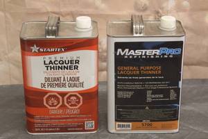 lot 180 image: 2 LAQUER THINNER 1 FULL THE OTHER LITTLE OVER HALF FULL