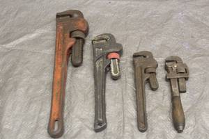 lot 63 image: TOTAL OF 4 PIPE WRENCHES 10 & 14