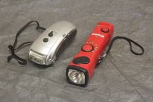 lot 69 image: TOTAL OF 2 EMERGENCY AMFM RADIO FLASHLIGHTS