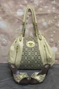 lot 10 image: VINTAGE VERSACE  HANGBAG 16 WITH MATCHING VERSACE HEELS SIZE 41