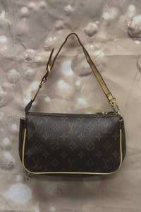 lot 14 image: LOUIS VUITTON MONOGRAM  V-00188 POCHETTE HANGBAG 9L