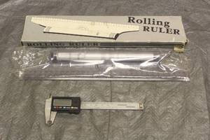 lot 28 image: M.S.R IMPORTS DRAFTING ROLLING RULER & DIGITAL CALIPER
