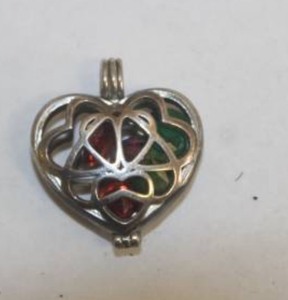 lot 199 image: HEART CAGE 925 STERLING SILVER PENDANT WITH 5 BIRTHSTONES WEIGHS 2.7 GRAMS