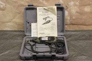 lot 55 image: MULTIPRO DREMEL 395 WITH MANUAL & CASE