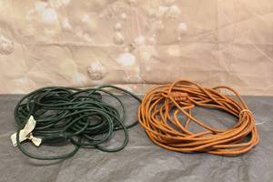 lot 64 image: TOTAL OF 2 - 50 FT EXTENSION CORDS , GREEN  ORANGE