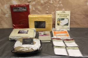 lot 73 image: TOTAL OF 11 PC LINEN - CURTAINS,BED SKIRTS, TABLE CLOTH, MATTRESS COVERS  SEE PICS