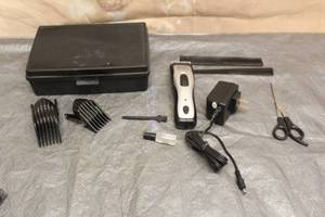 lot 97 image: WAHL RECHARGEABLE CORDLESS CLIPPERS WITH ACCESSORIES WITH CASE
