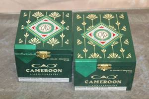 lot 44 image: TOTAL OF 2 CAO CAMERON LANNIVERSAIRE PERFECTO ROBUSTO WOOD CIGAR BOXES 4 12 & 6  , MADE IN NICARAGUA