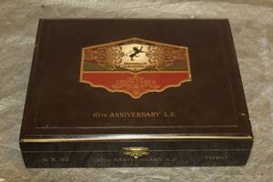 lot 118 image: EASTBAN CARRERAS CHUPA CABRA 10TH ANNIVERSARY TORO WOOD CIGAR BOX MADE IN NICARAGUA