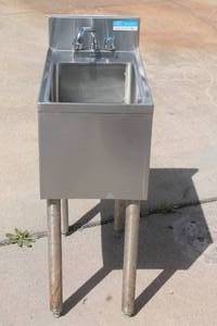 lot 9 image: BK RESOURCES  UB4-21-1014HSS12 STAINLESS STEEL UNDERBAR DUMP SINK  12W X 21 12 D X 32 12 H